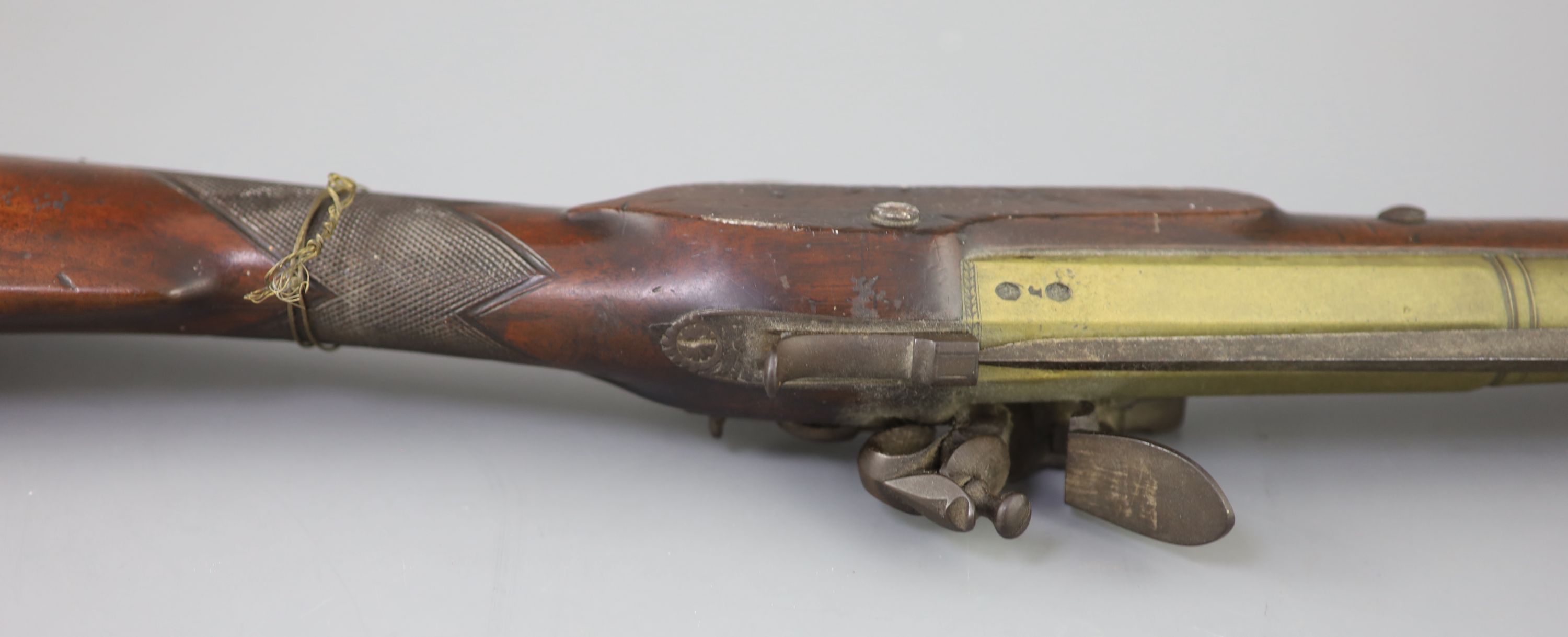 A late 18th century brass barrelled flintlock blunderbuss, by Jones, length 30in.